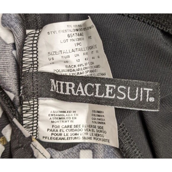 Wmn's MIRACLESUIT One-Piece Keyhole Front Black/White/Gold Metallic Swimsuit 10 - Picture 9 of 9